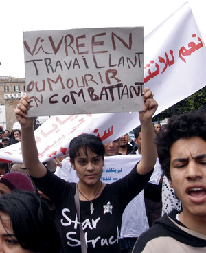 ‘To live with a job or die fighting’: the stark message of this Tunisian protester demonstrating against unemployment. The country needs investment but remains saddled with debt.