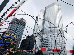 Besieged: police cordon off the HQ of the European Central Bank in Frankfurt, Germany, during the anti-capitalist ‘Blockupy’ demonstrations this June.  
