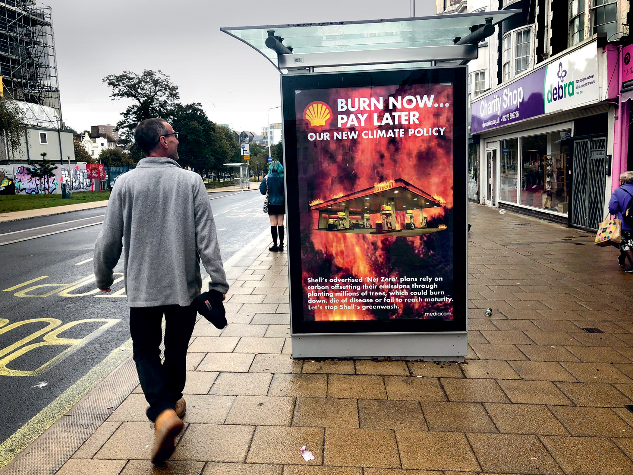 Hundreds of billboards and bus stops – like this one in Brighton, England – have been hacked by activists across Europe as part of the call to #BanFossilAds and stop greenwashing. Hundreds of billboards and bus stops – like this one in Brighton, England – have been hacked by activists across Europe as part of the call to #BanFossilAds and stop greenwashing.