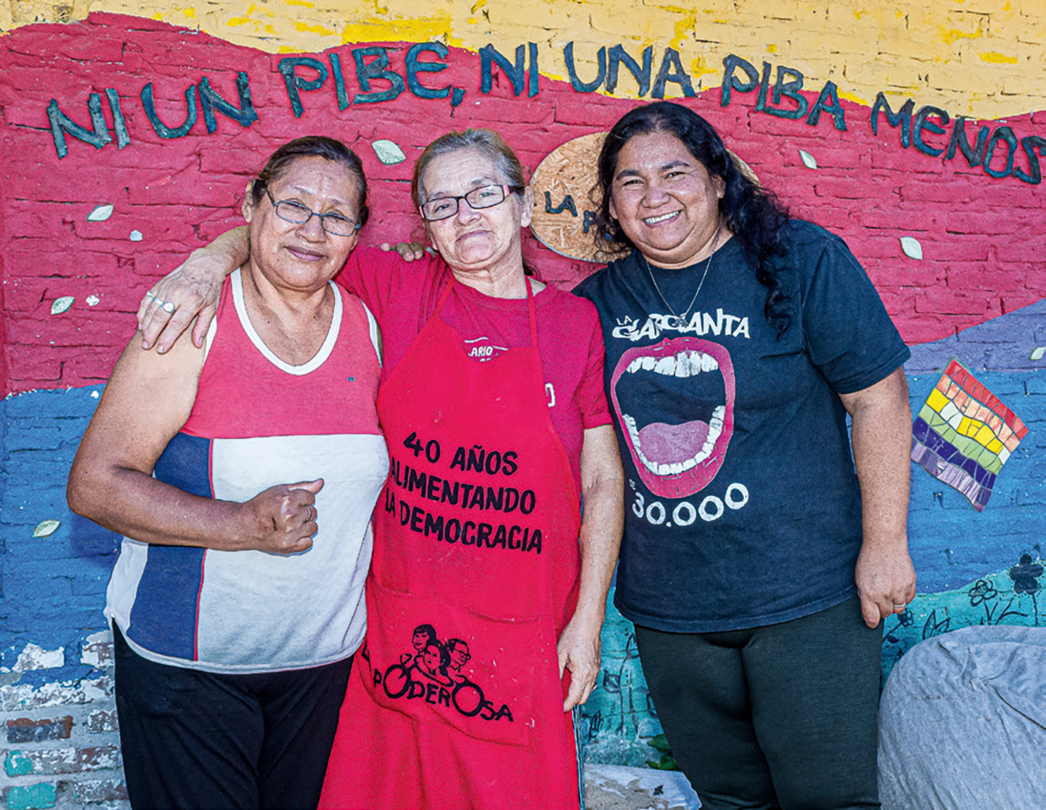 Eudelia Galeano (middle), and Monica Troncoso (right) say they are feeding more and more people with less resources at La Poderosa soup kitchen in Barrio Fátima, Buenos Aires. Eudelia Galeano (middle), and Monica Troncoso (right) say they are feeding more and more people with less resources at La Poderosa soup kitchen in Barrio Fátima, Buenos Aires.