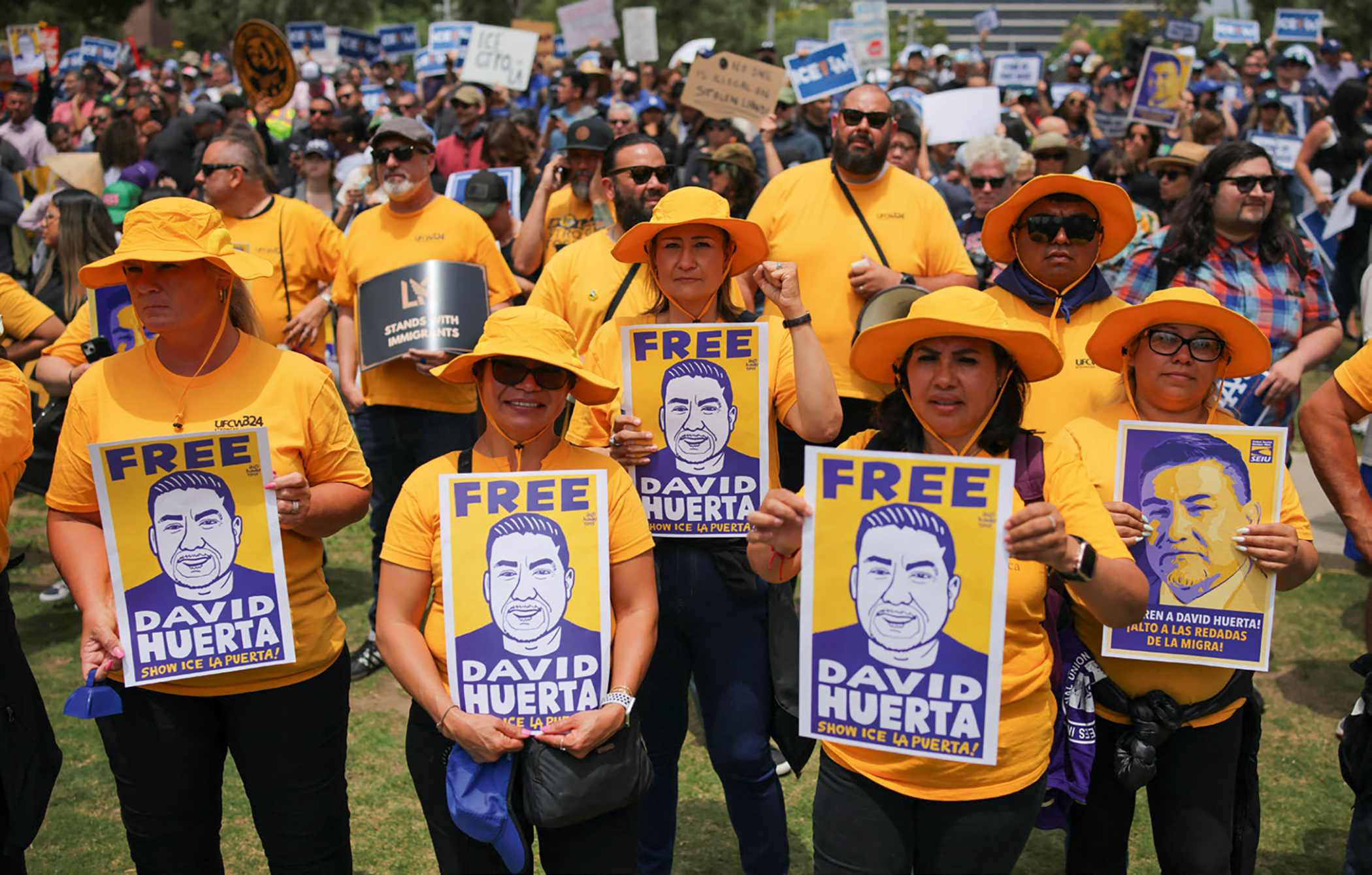 Trade union members hold up placards demanding the release of labour leader David Huerta at a rally in Los Angeles, California, on 9 June 2025. Huerta was arrested for protesting against federal immigration raids. Trade union members hold up placards demanding the release of labour leader David Huerta at a rally in Los Angeles, California, on 9 June 2025. Huerta was arrested for protesting against federal immigration raids.