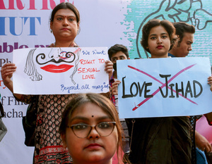 Indian students in Kolkata, India, condemn the ‘love jihad’ conspiracy theory at a rally on 14 February 2021. The myth, spread by Narendra Modi's ruling Bharatiya Janata Party (BJP), claims Muslim men are plotting to seduce Hindu women in order to convert them to Islam.Photo: Debajyoti Chakraborty/Nurphoto