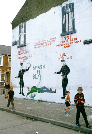 Snapped in 1991, this Belfast mural depicts Long Kesh H Block.