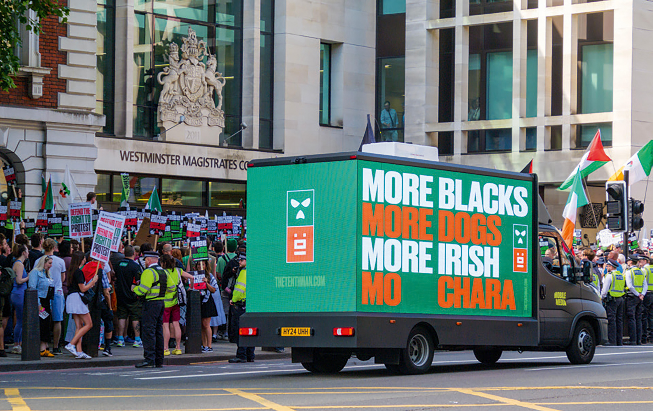 An ad van drives past Westminster Magistrates’ Court on 18 June 2025, in support of Kneecap member Liam Óg Ó hAnnaidh. He was accused of displaying a flag supporting Hezbollah during a gig.