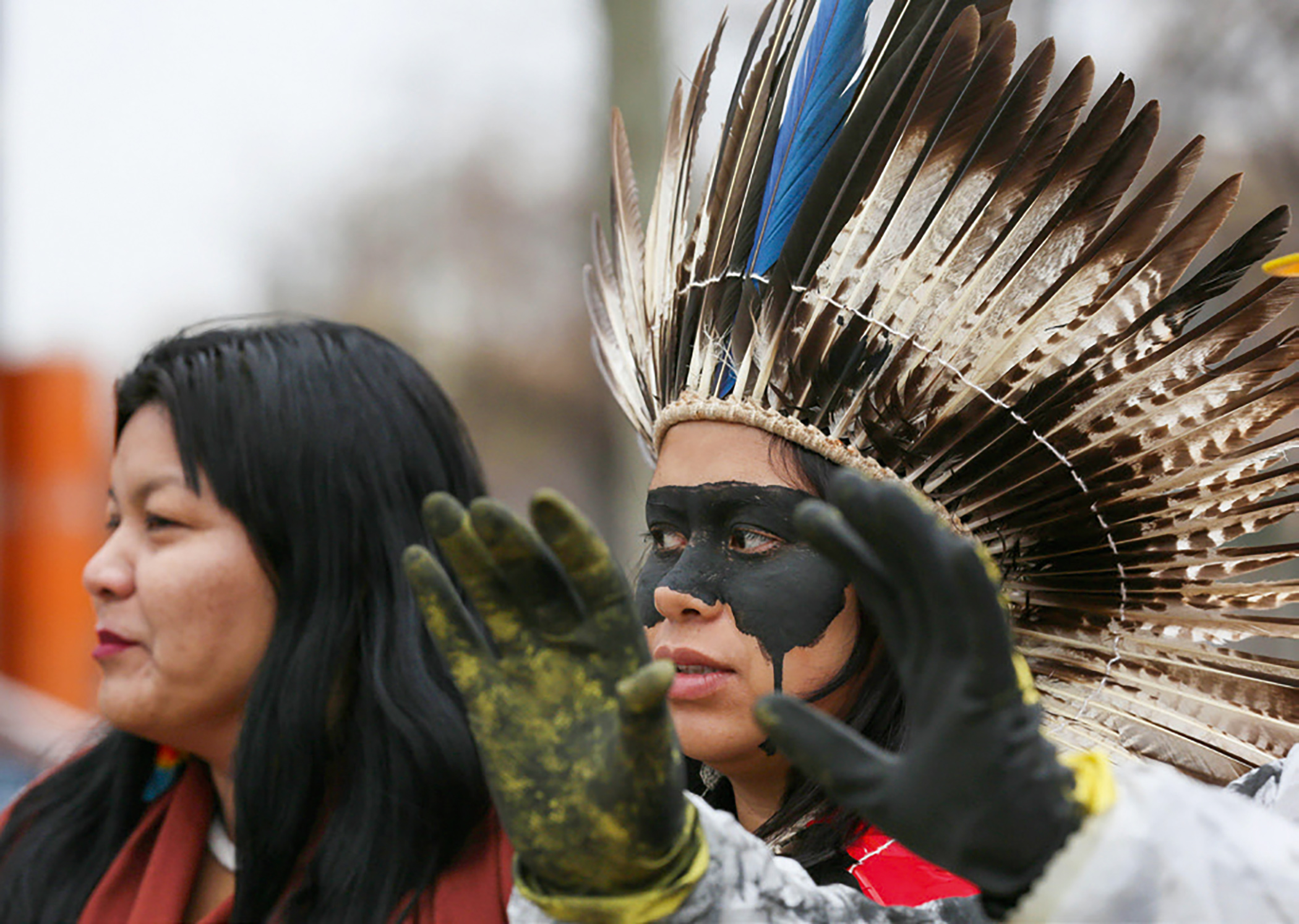 Indigenous leaders and other climate activists stand against the fossil fuel industry in Brazil. The protest took place during COP 25 in Madrid, Spain on 8 December 2019. Indigenous leaders and other climate activists stand against the fossil fuel industry in Brazil. The protest took place during COP 25 in Madrid, Spain on 8 December 2019.