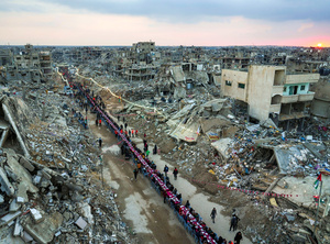 This year, on the first day of Ramadan in Rafah people gathered around a large table for iftar, the fast-breaking meal, as the sun set.Photo: Abdel Kareem Hana/AP Photo