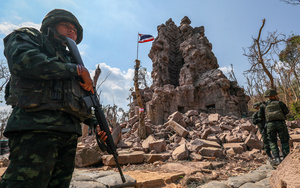 Thai soldiers stand next to the Prasat Ta Kwai temple, another ancient site damaged in the border conflict with Cambodia, in December 2025.Photo: Athit Perawongmetha/Reuters