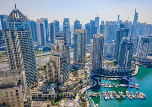 Glass empire: An aerial view of the plush Dubai Marina, a symbol of the UAE’s inordinate wealth and global ambition.Photo: Audrius Venclova/Alamy