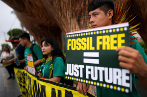 Indigenous people protest in front of a pre-COP30 meeting in Brasilia, Brazil on 14 October 2025.Photo: Eraldo Peres/AP Photo