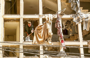 A man gestures as he collects belongings from a partially destroyed building in Beirut, Lebanon, on 10 April 2026. The building was hit by an Israeli air strike targeting the sea front.Photo: Marwan Naamani/Zuma Press Wire