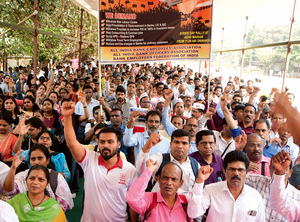 Bank employees and members of other trade unions gather in Mumbai, India, on 12 February, to protest the government’s anti-worker labour codes. The action is believed to be the biggest general strike in history with 300 million joining the one-day stoppage.Photo: Bhushan Koyande/Hindu Times/Alamy