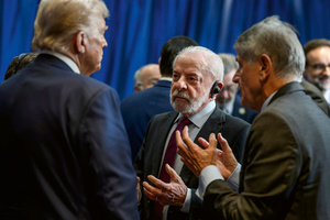 On the face of it, Luiz Inacio Lula da Silva, centre, has been defiant against Donald Trump, left. Here they speak before the start of a meeting in Kuala Lumpur, Malaysia on 26 October 2025.Photo: Daniel Torok/White House Photo/Alamy Live News