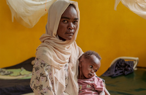 Bara Abdel Rahman holds on to her eight-month-old son Mohamed during his recovery at the malnutrition ward in the Lewere Cap Anamur Hospital, Kauda, on 14 February 2026.Photo: Guy Peterson