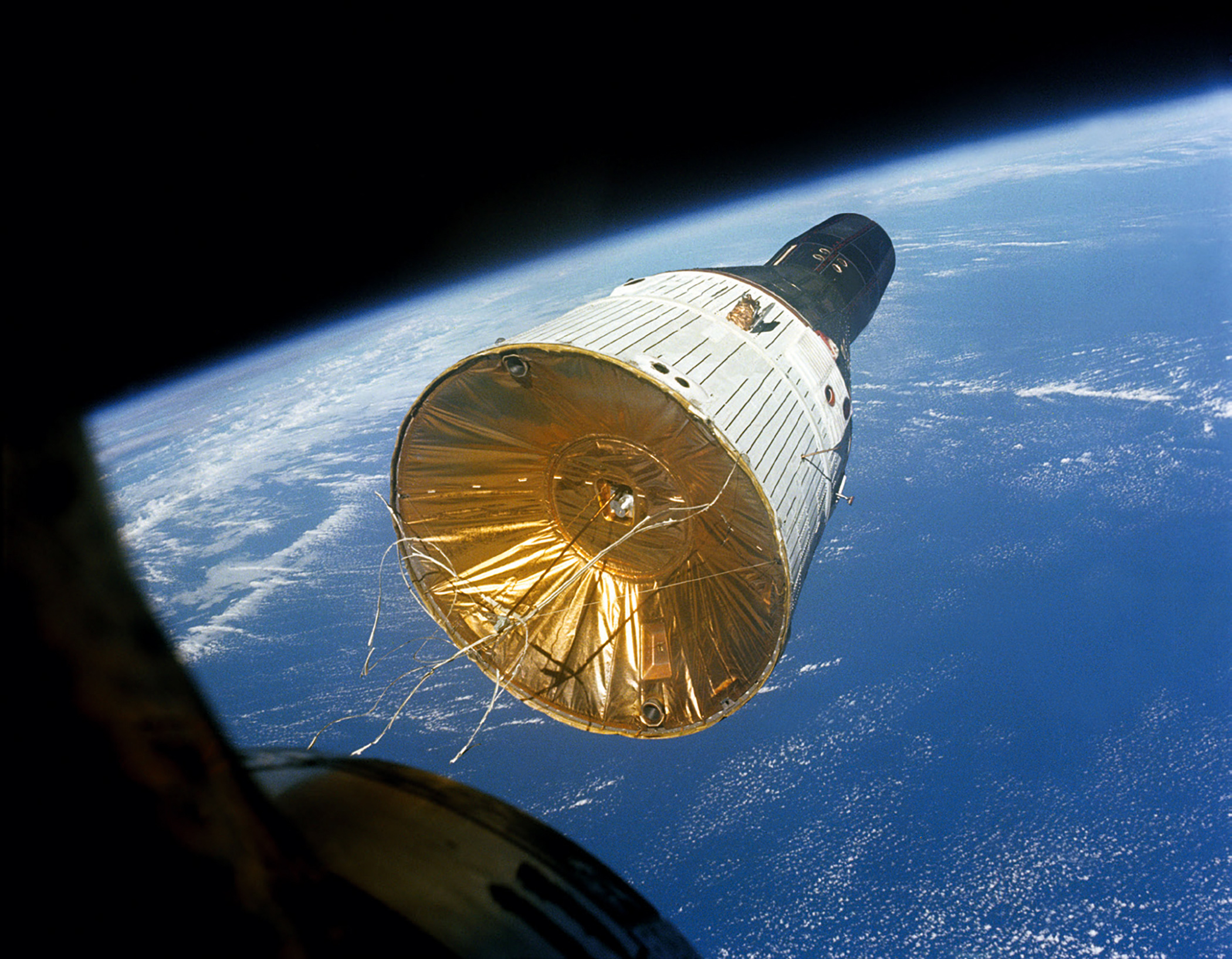 NASA’s Gemini VI spacecraft, pictured through the hatch window of the subsequent Gemini VII craft, around 260km above Earth, in December 1965. This was the first successful rendezvous of two human-crewed spacecraft.