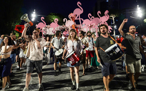 Protesters march with flamingo sculptures through Tirana, Albania, on 4 July 2026, against government corruption.Photo: Vlasov Sulaj/Nurphoto