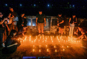 A group of journalists gather for World Press Freedom Day at the Dap-ay memorial site in the University of the Philippines campus, Quezon, on 2 May 2025. Filipino journalists continue to face harassment, threats and legal intimidation.Photo: George Buid/Imago/Matrix Images